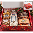 Holiday Ohio Gift Box with Ohio-made gourmet snacks including Buckeye Crunch, yogurt pretzels, artisan cookies and snack mixes in a red Christmas gift box. 